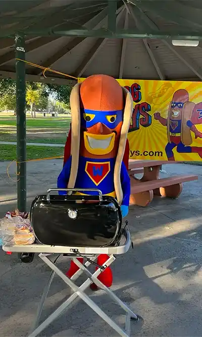 hot dog with mustard and relish in a bun